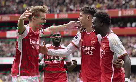 Arsenal keeps up title push with 3-0 win over Bournemouth