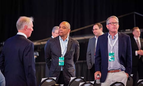  Ken Chenault, a director at Berkshire Hathaway, talks with other directors before the start of the company's annual meeting (Reuters)