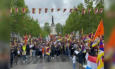 Protests in Paris upon arrival of Chinese President Xi Jinping (ANI) 