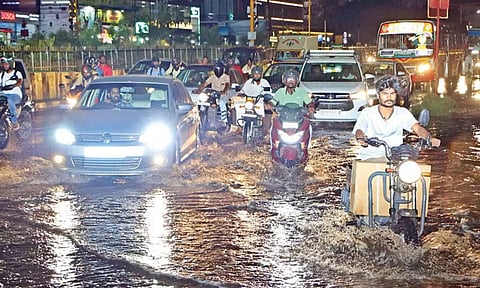 After a long dry spell, rains lashed Coimbatore, resulting in inundation of roads on Thursday