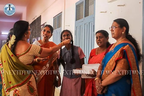 Teachers congratulate students on results being out for Class 10 on Friday (Photo: Hemanathan)