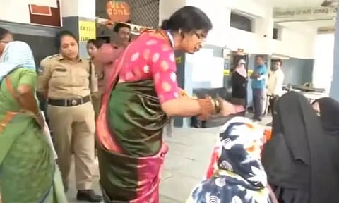 A video of BJP Hyderabad candidate Kompella Madhavi Latha asking burqa-clad voters to show their faces (ANI)