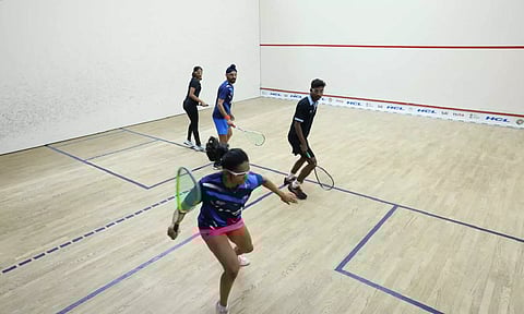Harinder Pal Sandhu and Rathika in action during mixed doubles match