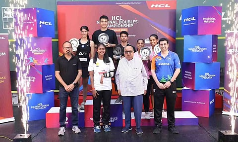  Winners of all the three categories pose with the trophies