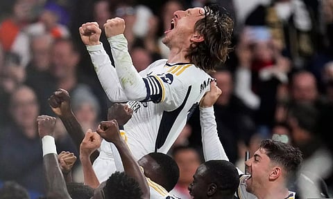 Luka Modric celebrates after winning LaLiga 2024