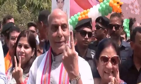 Defense Minister Rajnath Singh with his wife Savitri Singh, cast their votes in Lucknow (Image: ANI)