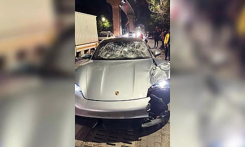 Mangled remains of a Porsche car after it got hit by a motorcycle at Kalyani Nagar, in Pune on May 19, 2024 (ANI)