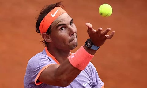 Rafael Nadal in action during his round of 64 match against Poland's (Reuters)