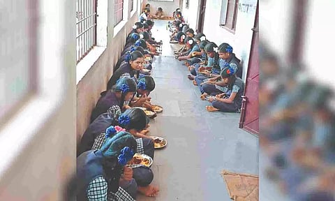 Students of a ADW school having breakfast