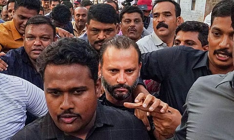 Builder Vishal Agarwal is brought at Pune Police Commissioner's office after his arrest, in Pune, Tuesday (PTI)