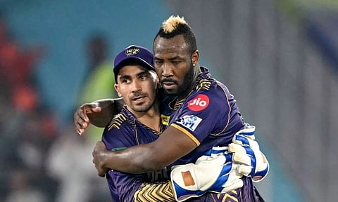 Wicket keeper Rahmanullah Gurbaz celebrates a wicket with Andre Russell against Hyderabad on Tuesday (PTI)
