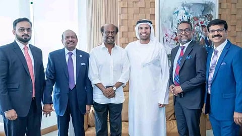 Mohamed Khalifa Al Mubarak, Member of Abu Dhabi Executive Council and Chairman of Department of Culture and Tourism (DCT), Government of Abu Dhabi handing over UAE Golden Visa to super star Rajinikanth in the presence of Yusuffali MA, CMD of Lulu Group. Also seen are V. Nandakumar, Rejith Radhakrishnan and Biju Kottarathil of Lulu Group