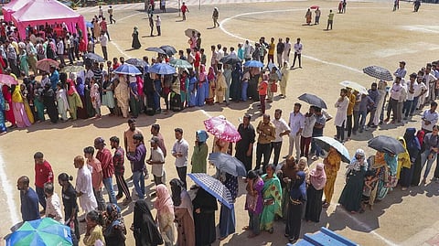  People wait to cast their votes for the sixth phase of Lok Sabha elections, in Ranchi (Photo: PTI)