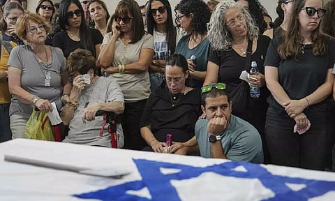 Mourners attend the funeral of Michel Nisenbaum, who was killed during Hamas attack (AP)