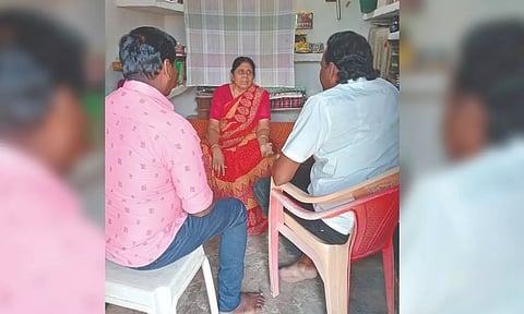 The retired teacher Kuppammal interacting with her sons Mohan and Gopi, who have come home on parole