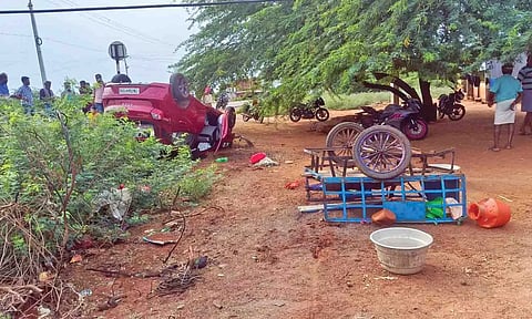 Overturned car and tricyle at the accident spot