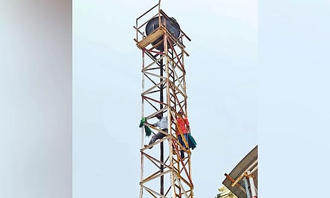 Farmers stage protest atop Karthigai Deepam tower in Uchchi Pillayar temple on Rockfort Hill