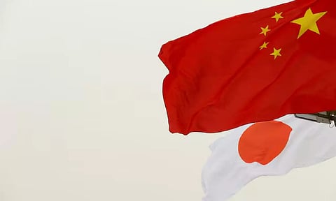 China and Japan Flag (Reuters)