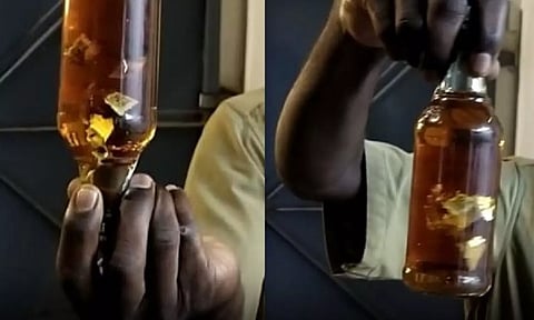 Vellore auto driver discovers sticker in liquor bottle