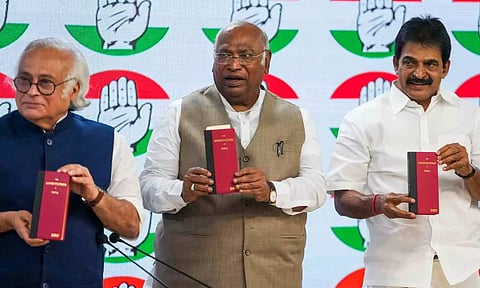  Congress President Mallikarjun Kharge along with party leaders Jairam Ramesh and K C Venugopal (PTI)