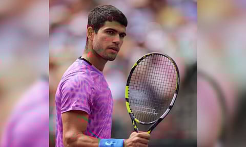 Alcaraz pushes through for second week at Roland Garros