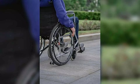 A person using a wheelchair. (Photo: Pexels) 