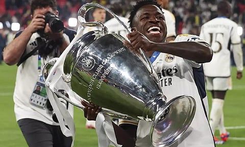 Real Madrid's Vinicius Junior celebrates at the end of the Champions League final soccer match between Borussia Dortmund and Real Madrid at Wembley Stadium in London (AP)