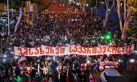 Demonstrators take part in a procession to protest against a bill on "foreign agents" and to support Georgia's membership in the European Union (Photo/Reuters)