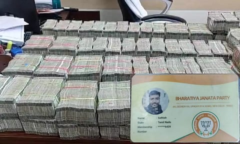  The seized cash (inset) ID proof of the BJP cadre
