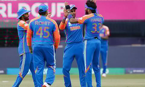 Team India celebrates after a wicket