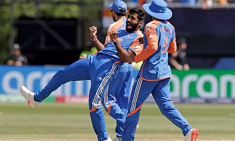 Jasprit Bumrah celebrates after taking a wicket (PTI)