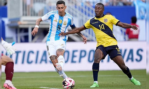 Angel Di Maria shrugs off Alan Minda to score for Argentina