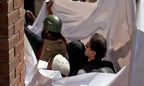 Former Pakistan PM Imran Khan, Bushra Bibi (Photo/Reuters)