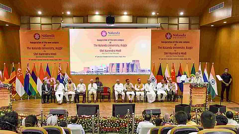  Prime Minister Narendra Modi plants a sapling during the inauguration of Nalanda University, in Nalanda district, Bihar, Wednesday, June 19, 2024. Bihar CM Nitish Kumar and Deputy CM Samrat Choudhary are also seen. (Photo/PTI)