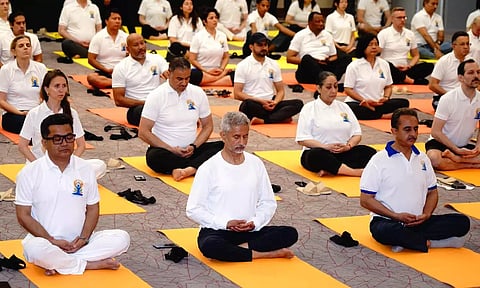 External Affairs Minister S Jaishankar, joined by his two deputies Kirti Vardhan Singh and Pabitra Margherita, performed a few asanas, along with several members of the diplomatic community at an indoor facility