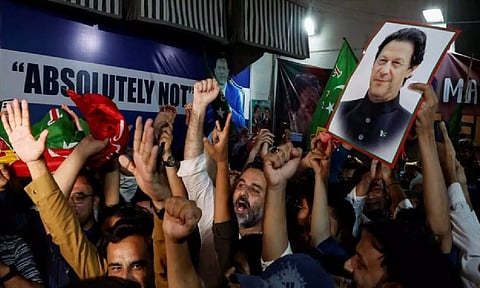 Supporters of former Prime Minister Imran Khan's party, the Pakistan Tehreek-e-Insaf, in Karachi (Photo: Reuters)