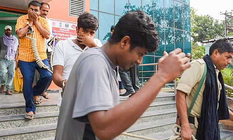 Economic Offences Unit personnel leave with the accused arrested for the alleged irregularities in NEET-UG exams 2024 case (PTI)
https://www.deccanchronicle.com/nation/current-affairs/neet-ug-row-5-more-held-in-bihar-for-paper-leak-900565