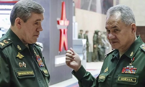  Russian Defense Minister Sergei Shoigu, right, gestures as he speaks to Russian Chief of General Staff Gen (AP)