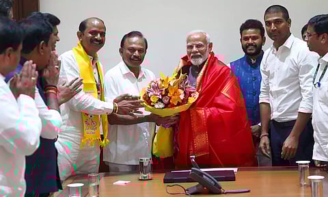 PM Narendra Modi with TDP MPs during a meeting, at Prime Minister's Office in Parliament (PTI)