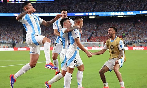 Lautaro Martinez and his teammates celebrate Argentina's winner on Tuesday night