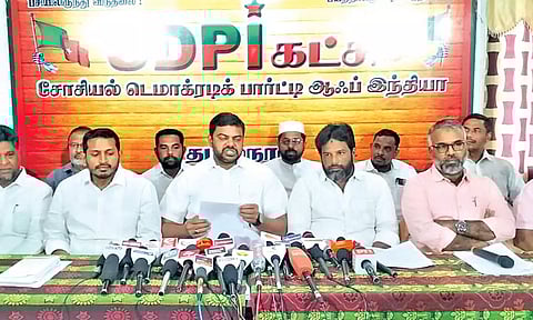SDPI leader Nellai Mubarak addressing reporters in Tiruchy on Friday