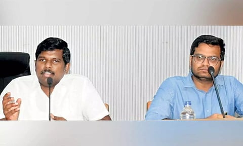 Collector M Pradeep Kumar addressing the traders