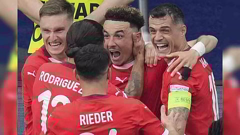 Team Switzerland players celebrate their win (Photo/IANS)