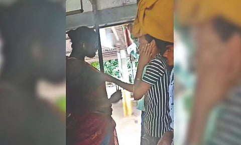 Screengrab of trans woman slapping a migrant worker on a local train