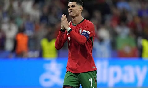 Cristiano Ronaldo reacts after scoring in penalty shootout against Slovenia (Photo: AP)