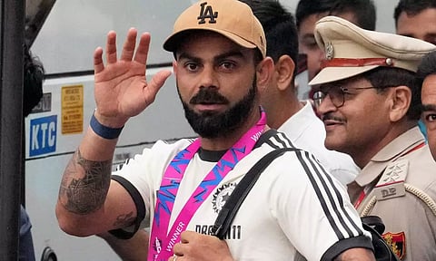  Virat Kohli waves upon his arrival at New Delhi airport (PTI file photo)