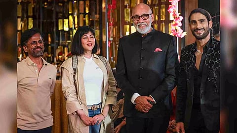 A. R. Murugadoss, Wardha Khan Nadiadwala posing alongside Sathyaraj and Prateik Babbar (Photo/X)