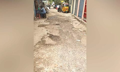 Potholes on the street connecting the area with busy Nungambakkam