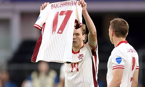 Jacob Shaffelburg celebrates after scoring for Canada 