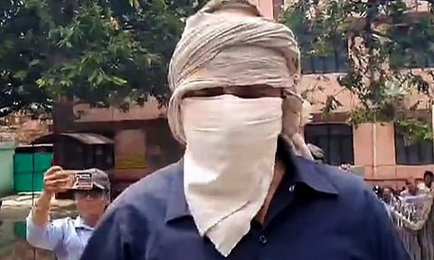 Prime accused of the Hathras stampede case, Devprakash Madhukar, being brought by police to a hospital for medical examination, in Hathras (PTI)